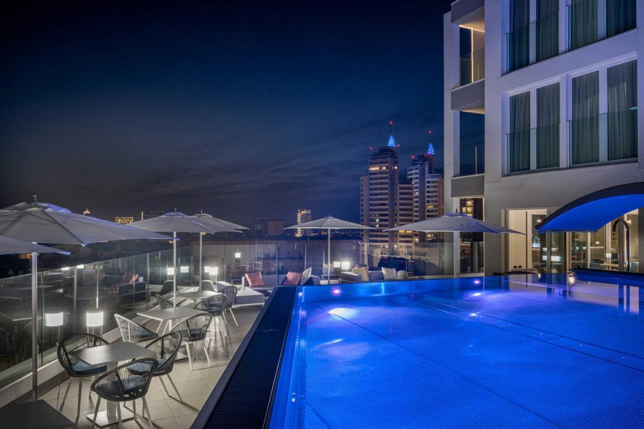 J44 Lifestyle Hotel Lido di Jesolo Exterior foto The swimming pool at the hotel