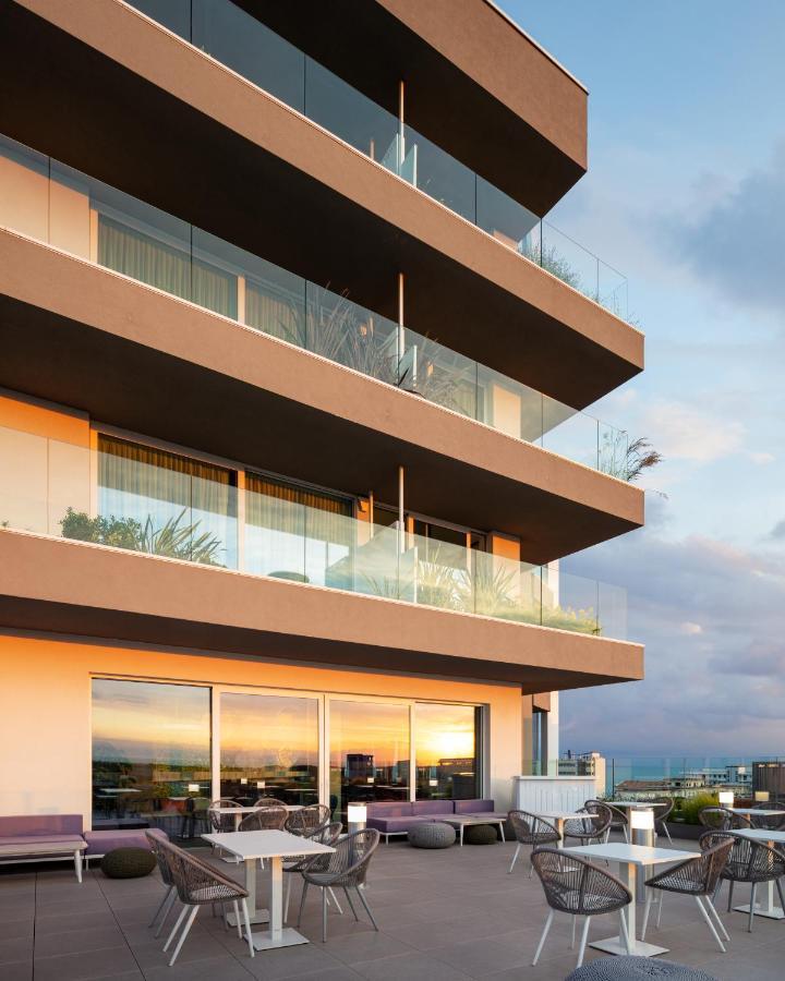 J44 Lifestyle Hotel Lido di Jesolo Exterior foto The 3D rendering of the building